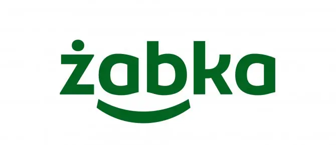 Logo Żabki i stacji paliw obok siebie, z małym jednorazowym e-papierosem, symbolizujące ograniczony asortyment i brak większych modeli Fumot w tych miejscach.